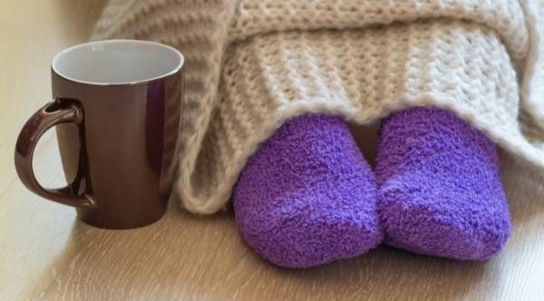 Cold feet in cozy socks due to PAD