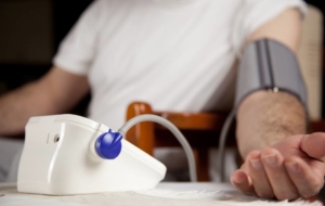 Man checking blood pressure levels