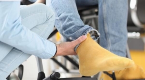 Woman massaging foot to regain feeling