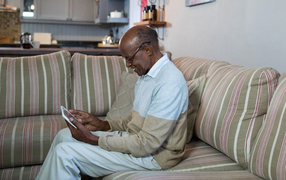 senior man using tablet to read about his vascular and arterial health