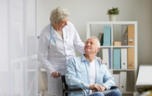 Doctor speaking with senior patient about treatment options