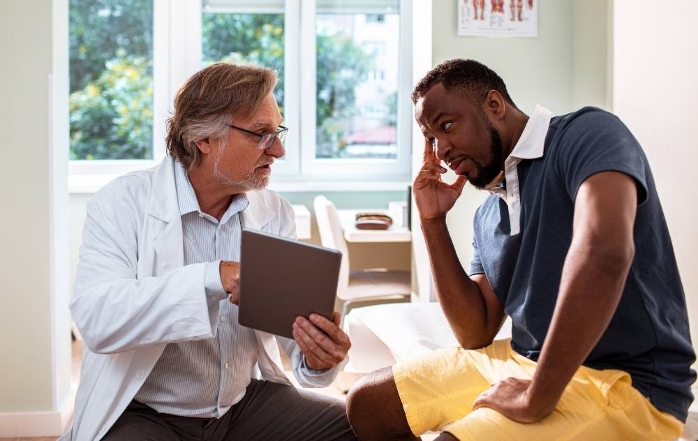 Man at consultation with his doctor