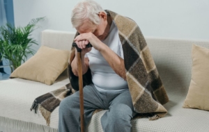 senior man unable to walk due to peripheral artery disease. the effects of smoking
